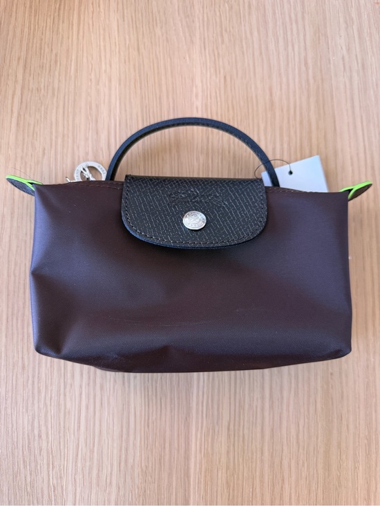 Longchamp Handbags - NWT Longchamp Le Pliage green mini pouch